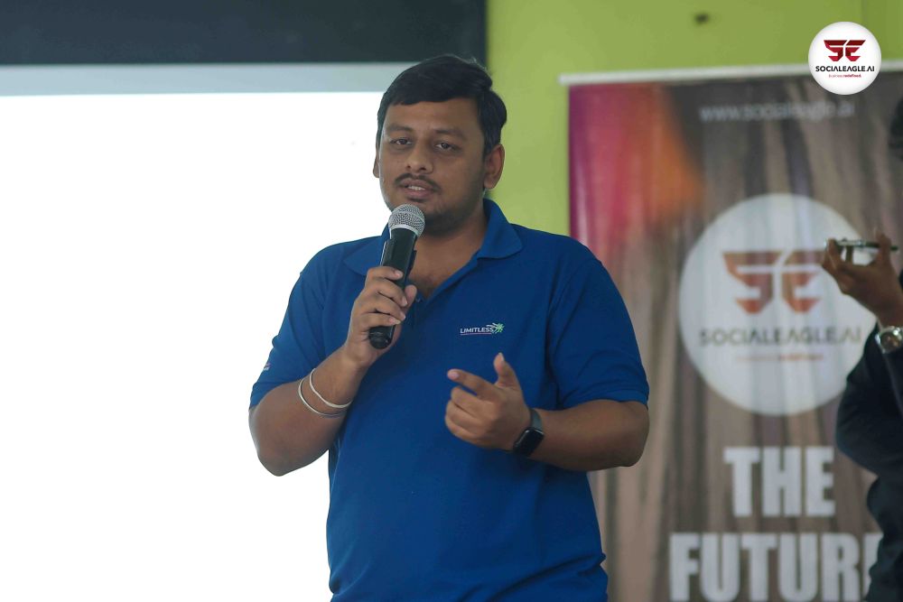 Man in traditional attire speaking at podium
