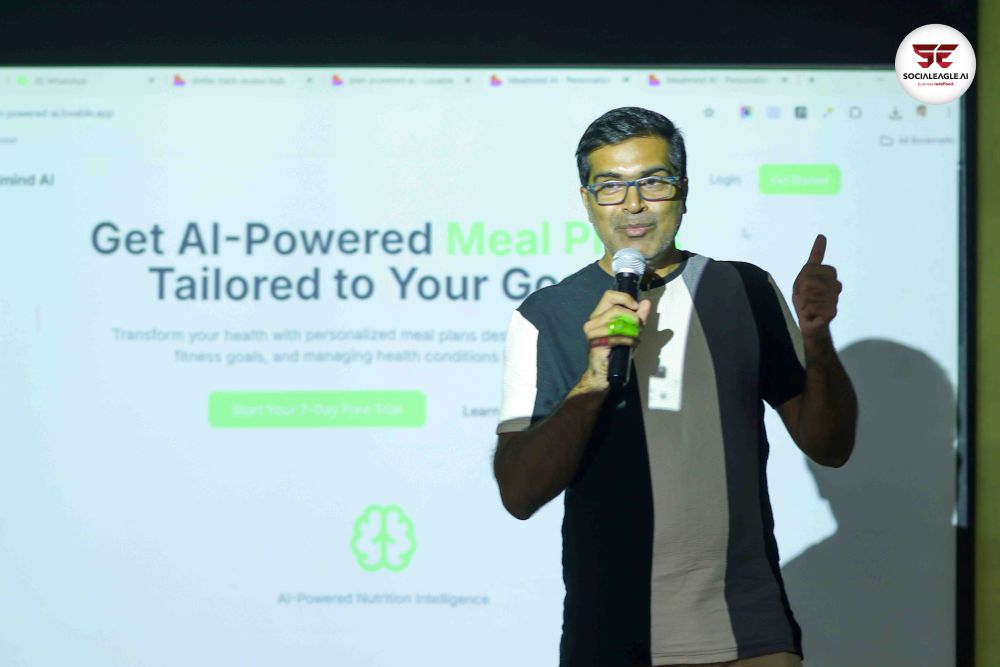 Four people at podium presentation including woman in red